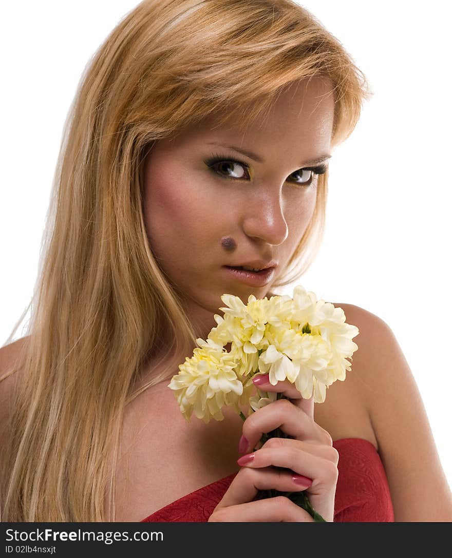 The beautiful women with a yellow flower. The beautiful women with a yellow flower