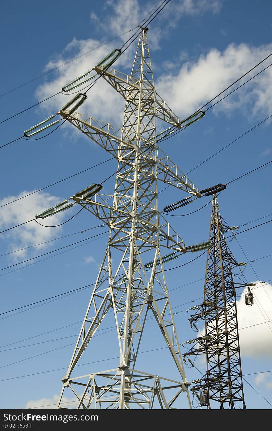 High-voltage electric support on the sky background