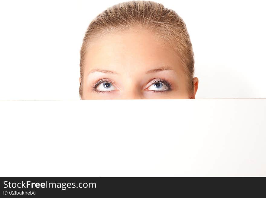 Caucasian blond woman peeping white board. Caucasian blond woman peeping white board