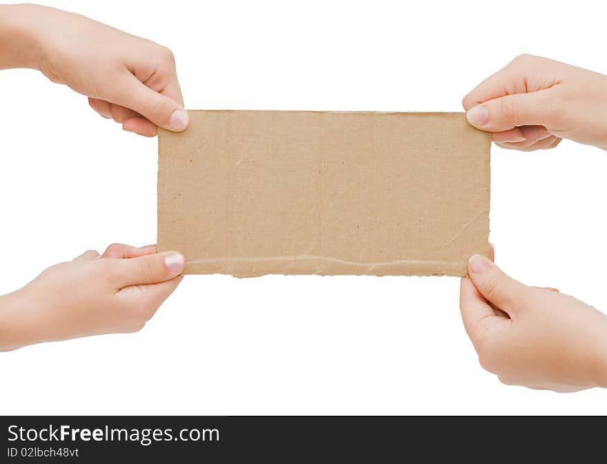 The cardboard tablet in a hand isolated over white