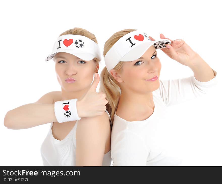 Two pretty football fan girls in funny hats