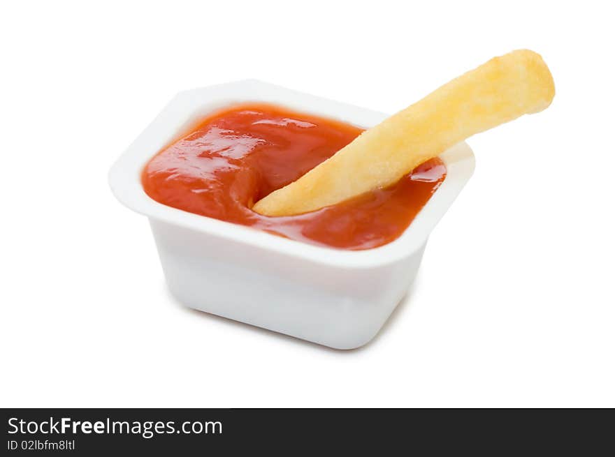 Potato free in ketchup isolated on white background