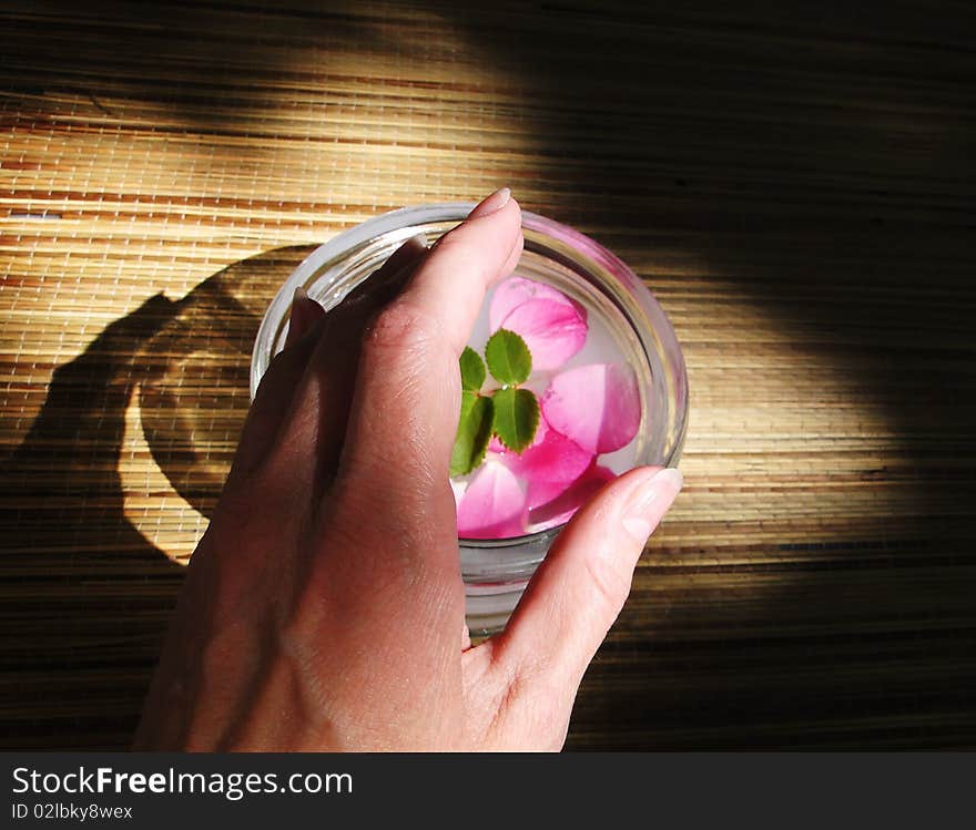 Human hand with nail bath