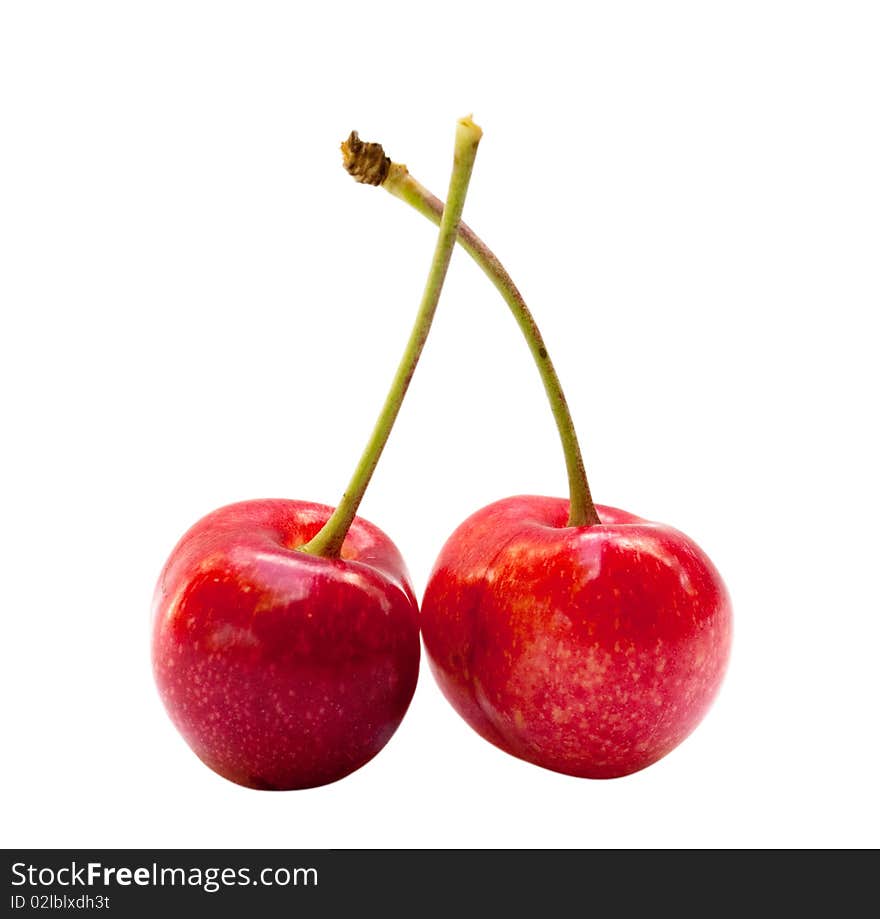 Red sweet cherries on a white background