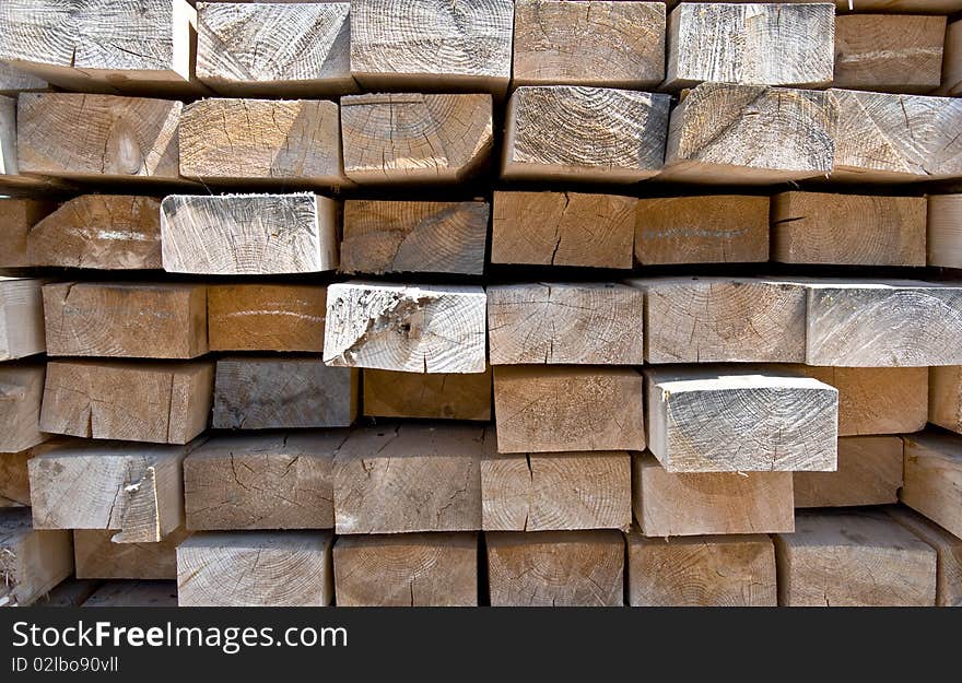 The texture of wooden bars placed on each other. Frontal. Close-up. Clipart.