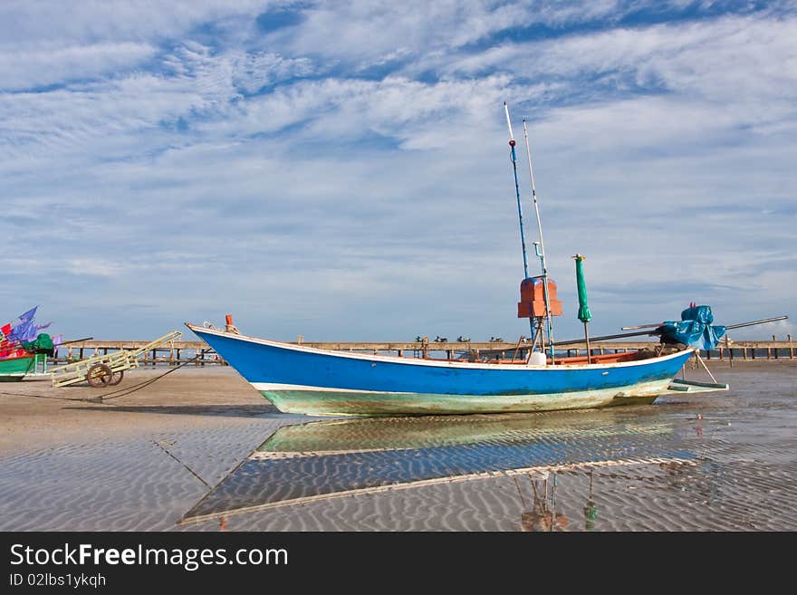 Fishery boat stay on beach, Thai sea image