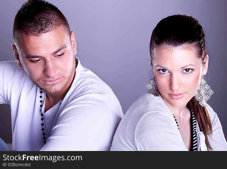 Young love couple posing, studio shot. Young love couple posing, studio shot