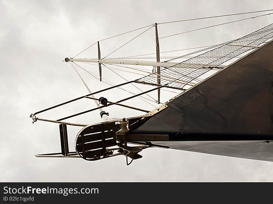 Blue hull sailboat photographed from an original point of wiew