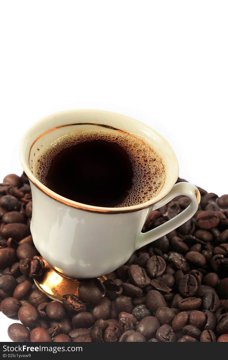 Coffee cup and grain on white background. Coffee cup and grain on white background