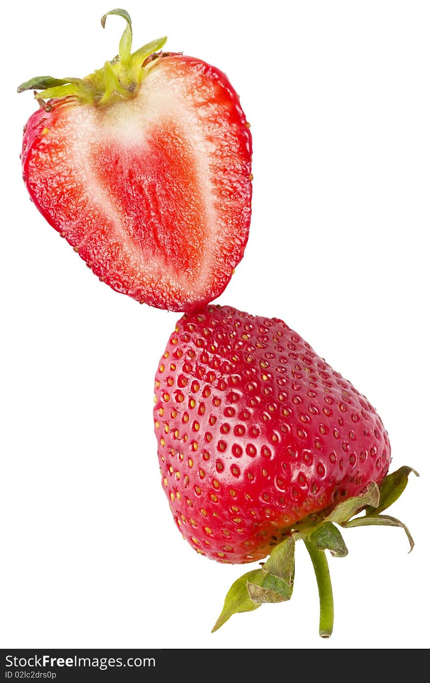 Two halves of sliced strawberry macro shot isolated over white background