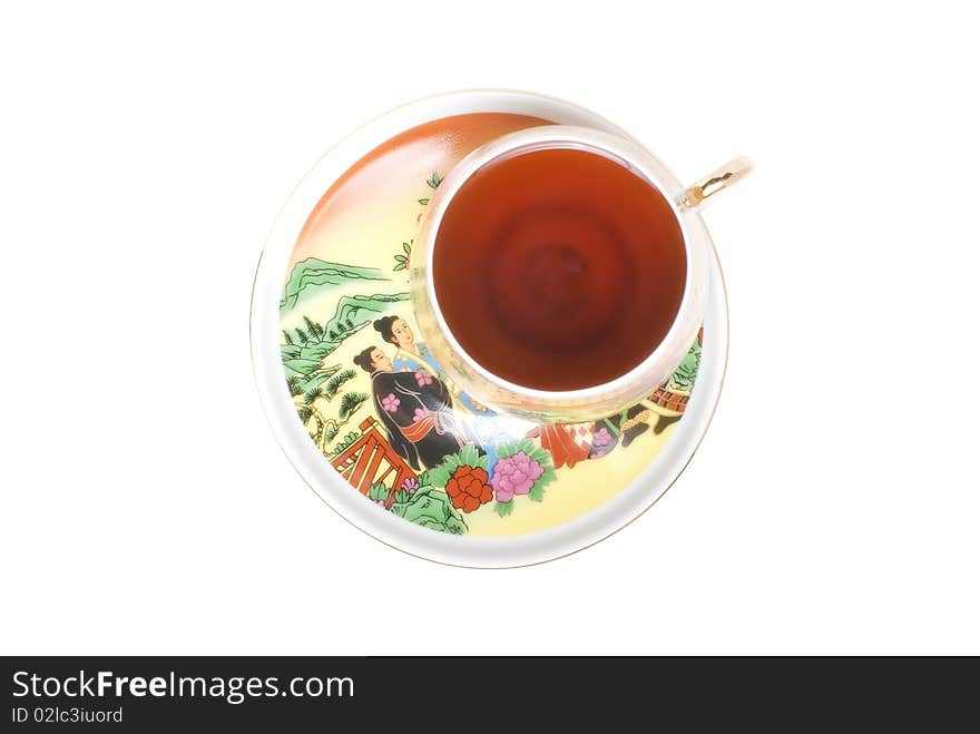 Isolated cup of black chinese tea with art illustration on hystorical themes. Isolated cup of black chinese tea with art illustration on hystorical themes.