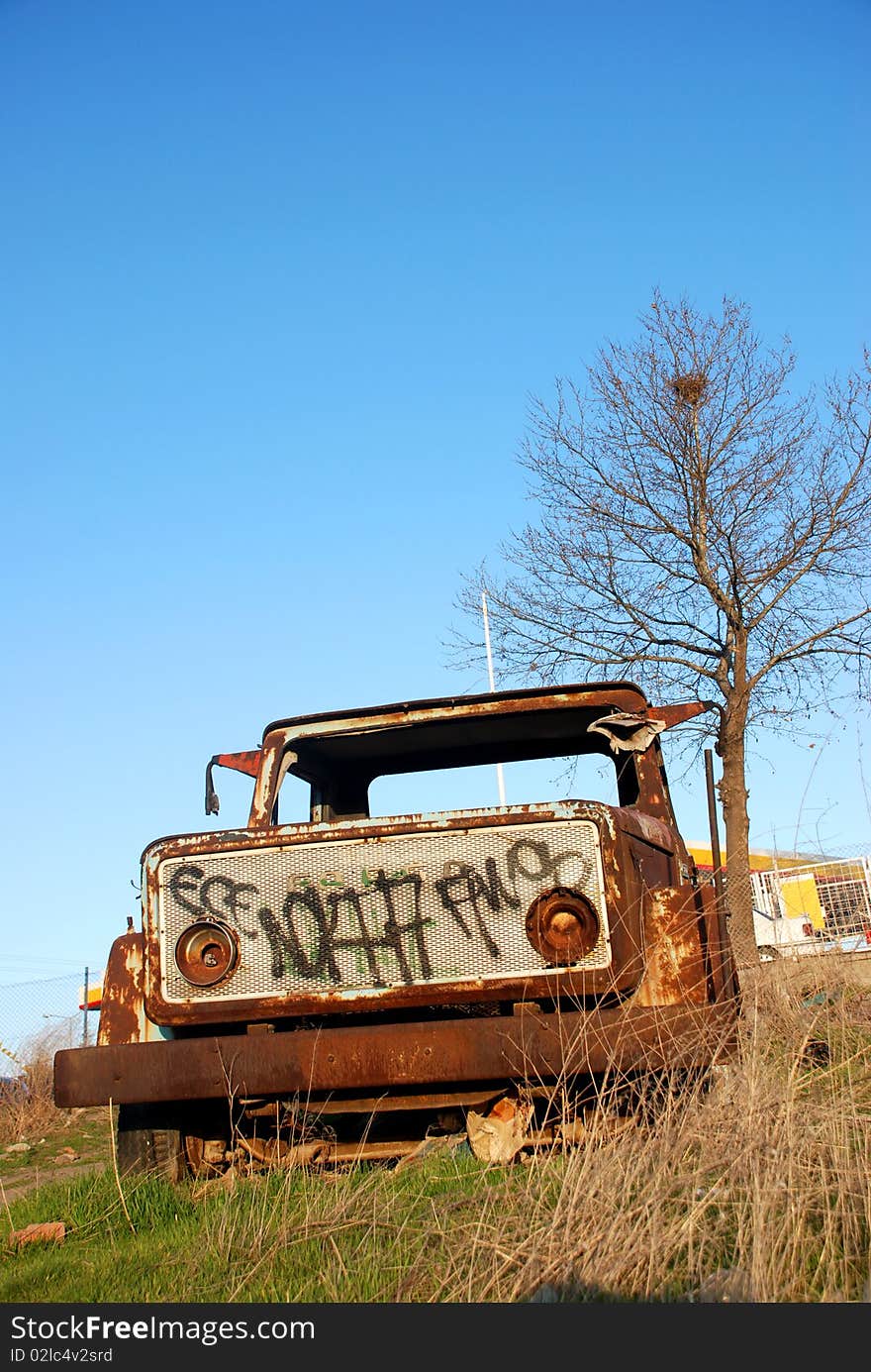 Vintage truck abandoned and rusting away in the fields. Vintage truck abandoned and rusting away in the fields