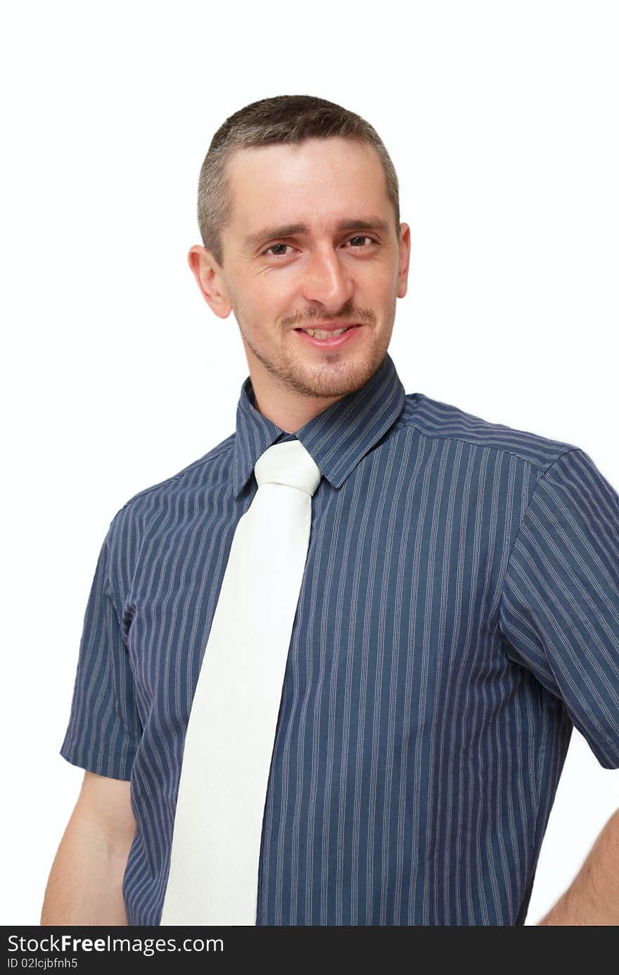 Smiling young businessman on a white background