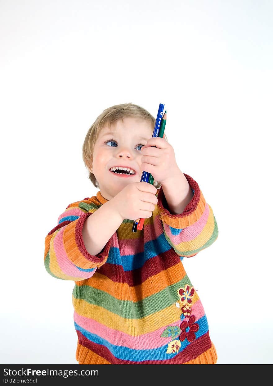 Young laughing girl with her colored pencils. Young laughing girl with her colored pencils