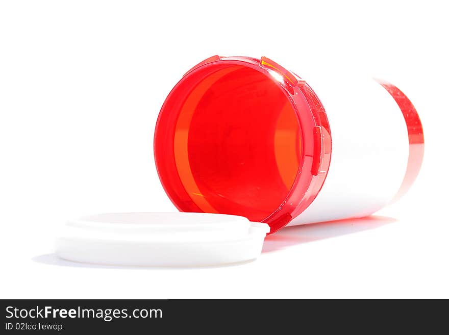 The empty open plastic container for tablets.