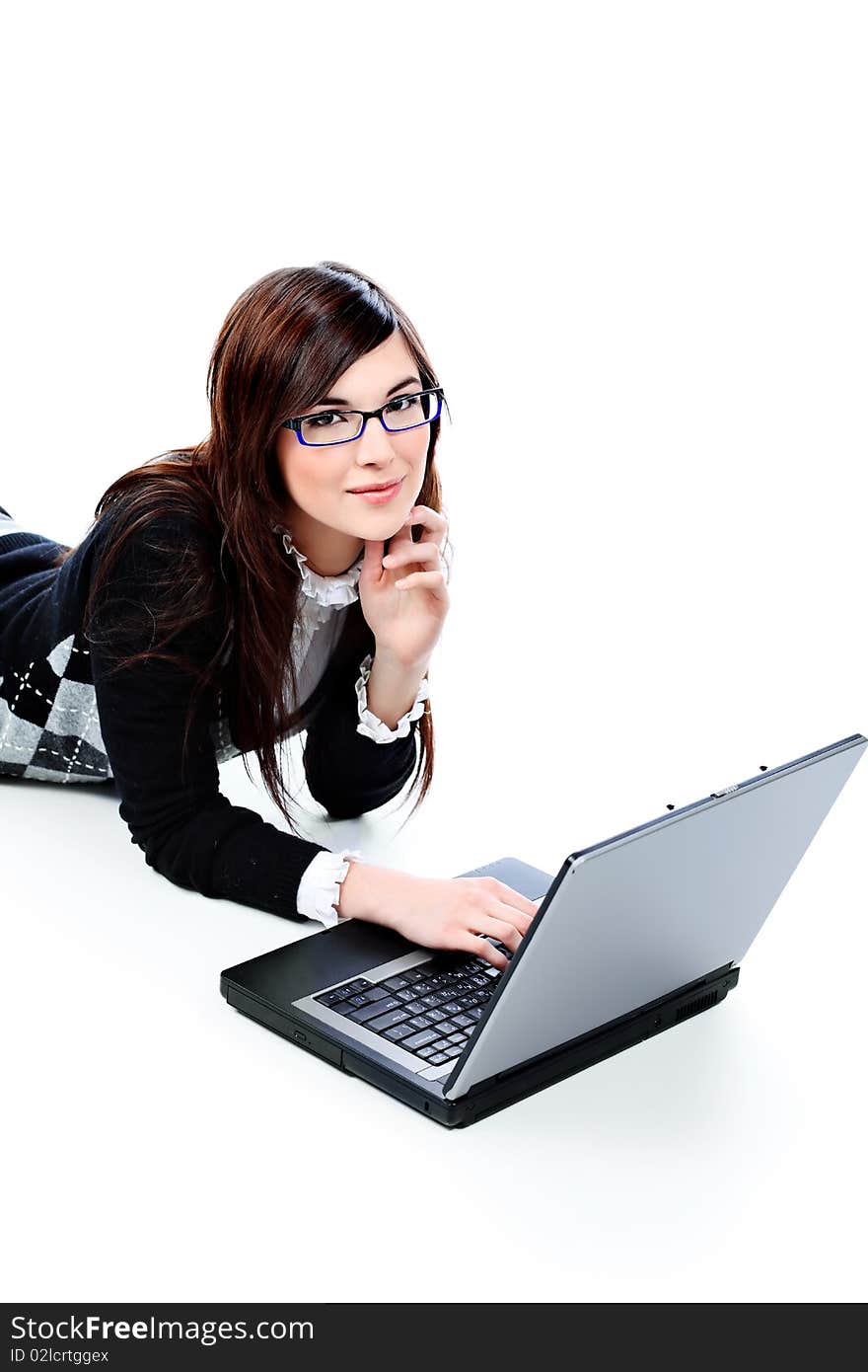 Portrait of a beautiful young woman in a business suit with a laptop. Isolated over white background. Portrait of a beautiful young woman in a business suit with a laptop. Isolated over white background