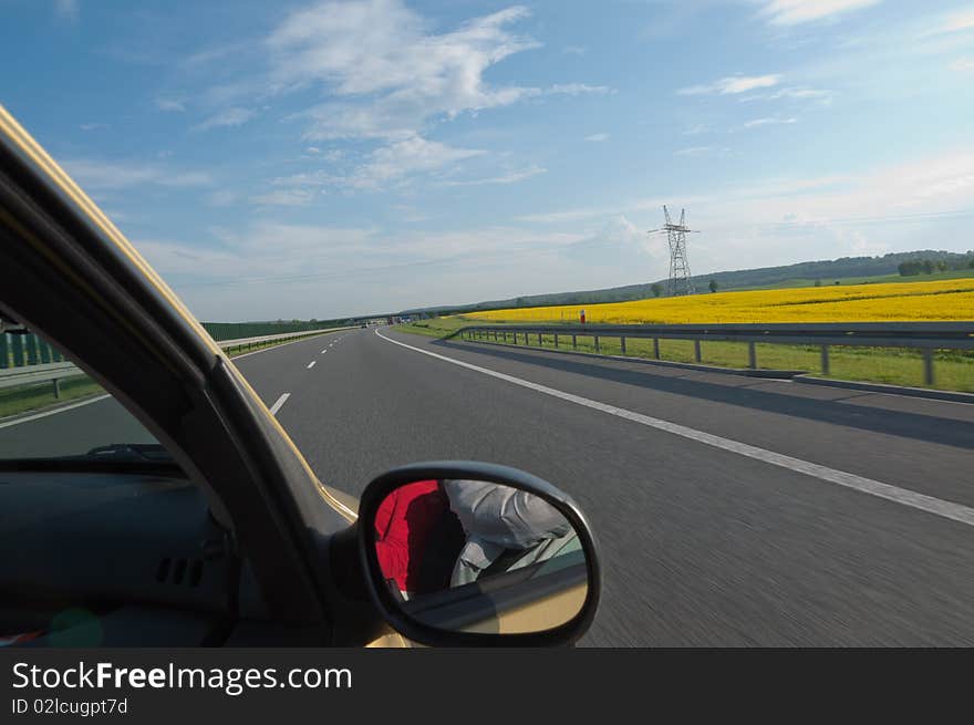 High speed driving on the highway. Visible motion blur.