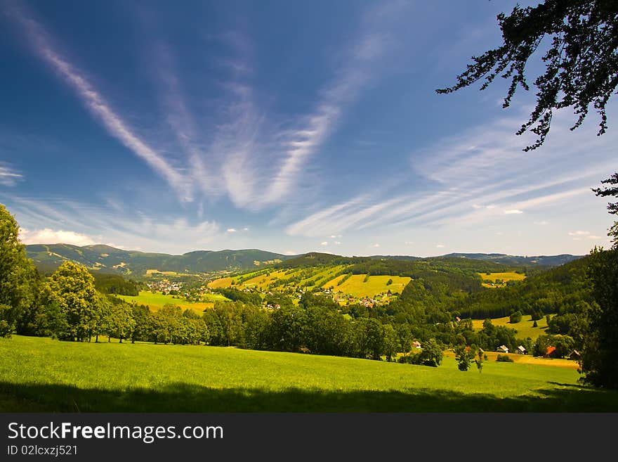 Scenery with hill and blue sky with impressive clouds. Scenery with hill and blue sky with impressive clouds