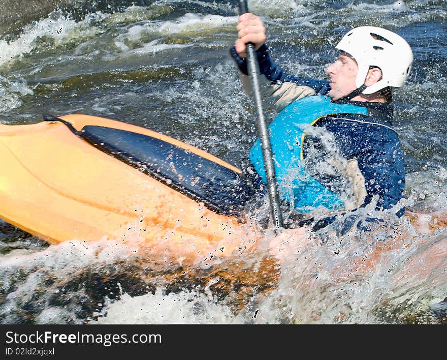 A shot of the kayaker on the rough water