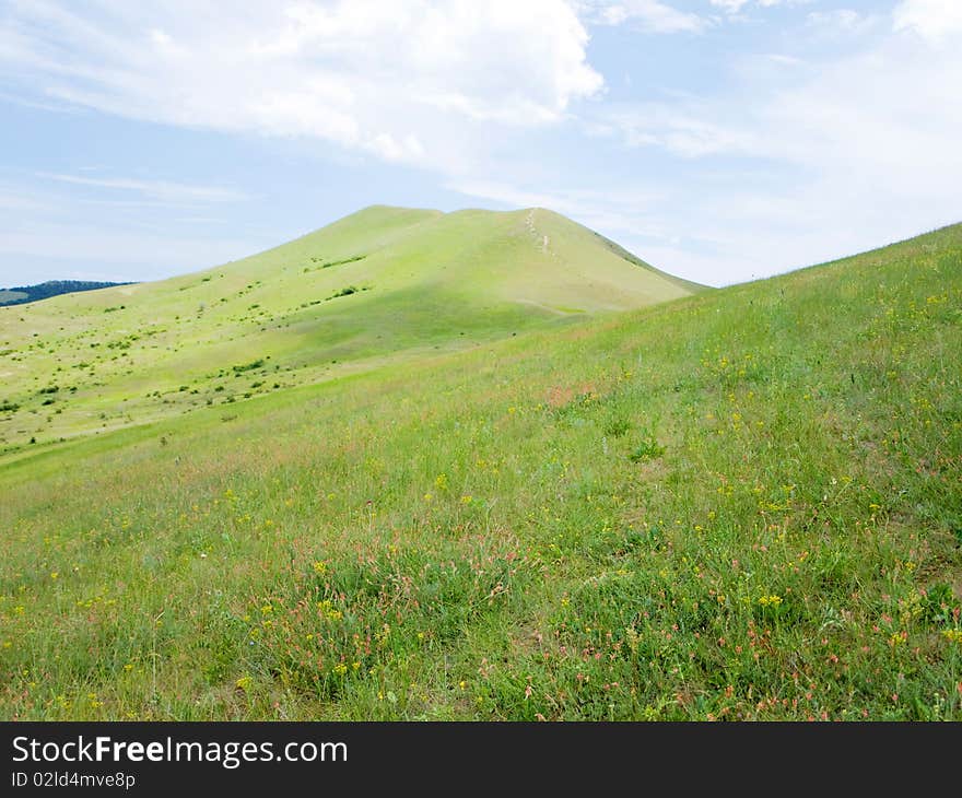 Background of cloudy sky and mountain landscape