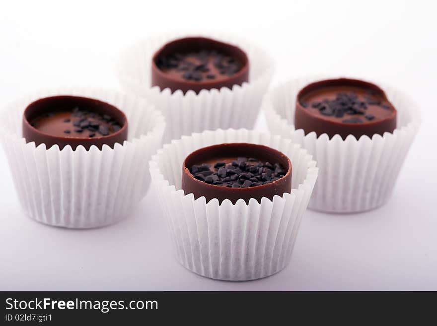 Chocolate candies in paper cups