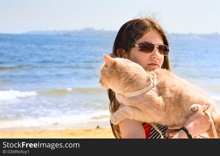 Teen girl with cat outdoor