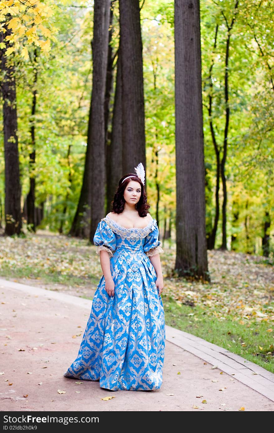 A portrait of lady in blue baroque dress