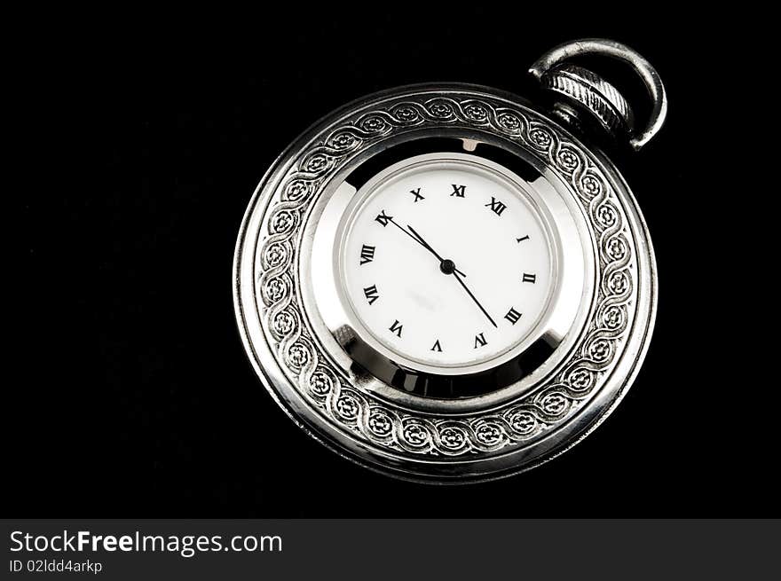 Elegant carved pocket watch