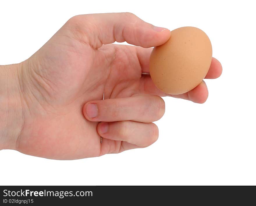 Man hand holding egg and needle. Man hand holding egg and needle