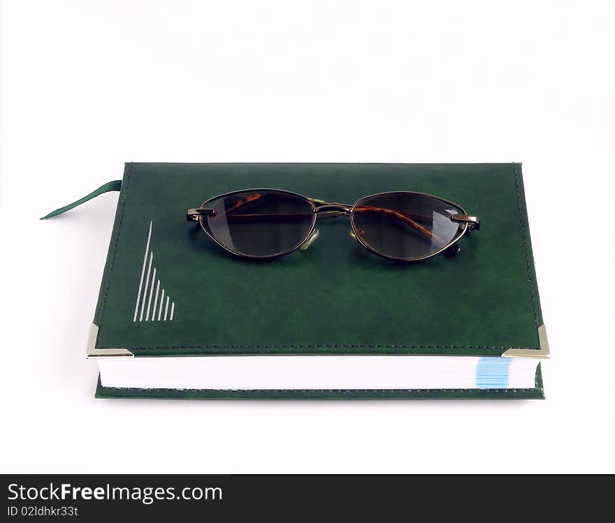 Glasses and notebook