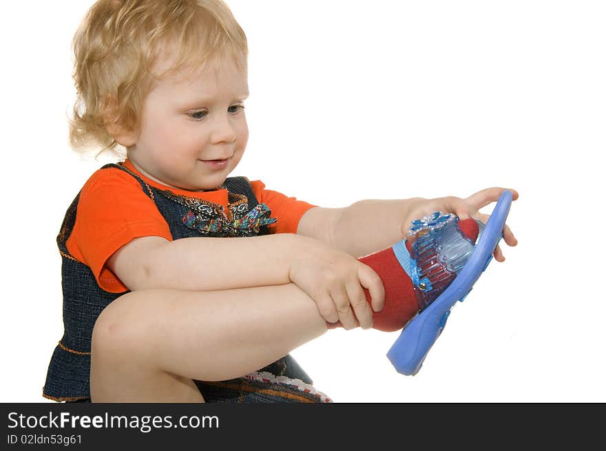 Small girl on white background dresses footwear. Small girl on white background dresses footwear