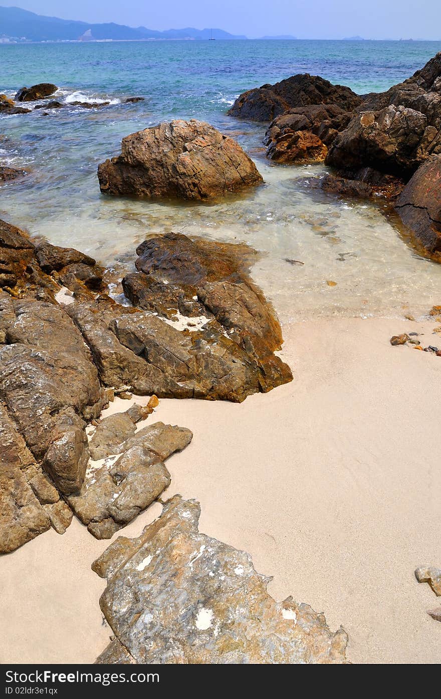 Reef and sand on beach