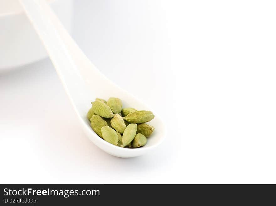 Cardamom Pads On White Background