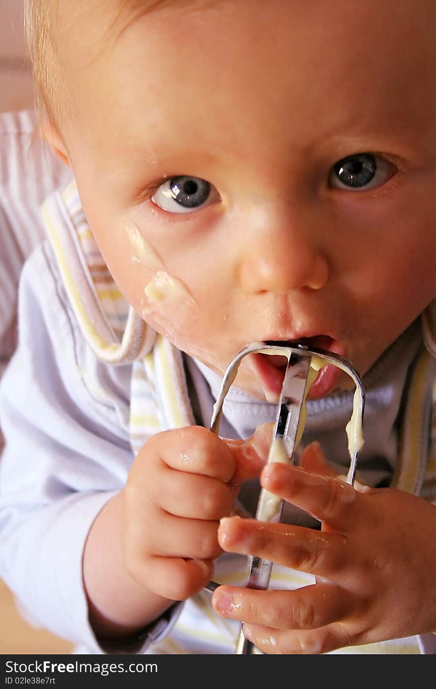 Nice little face of an caucasian baby eating. Nice little face of an caucasian baby eating