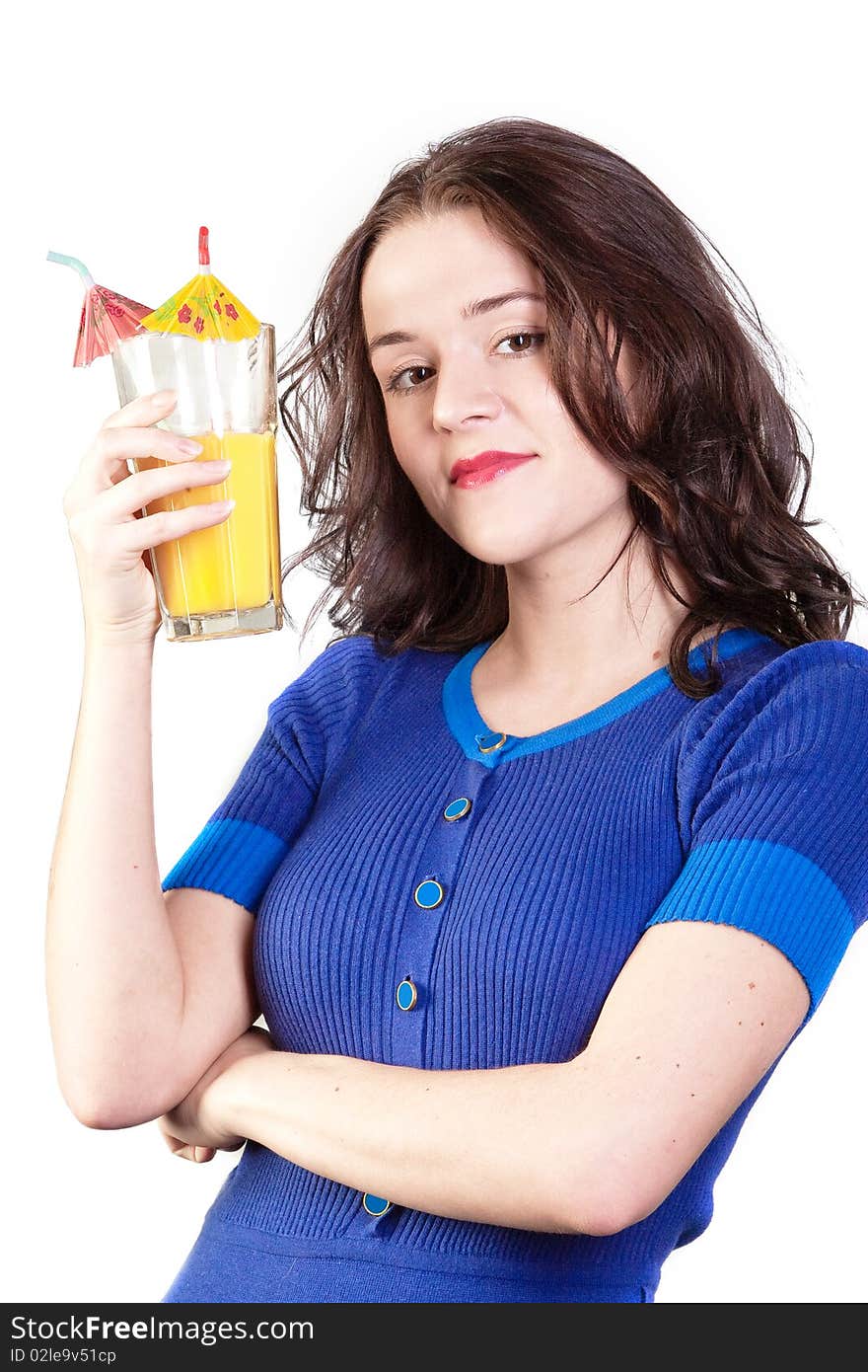 Beauty woman in blue dress with yellow orange juice isolated on a white