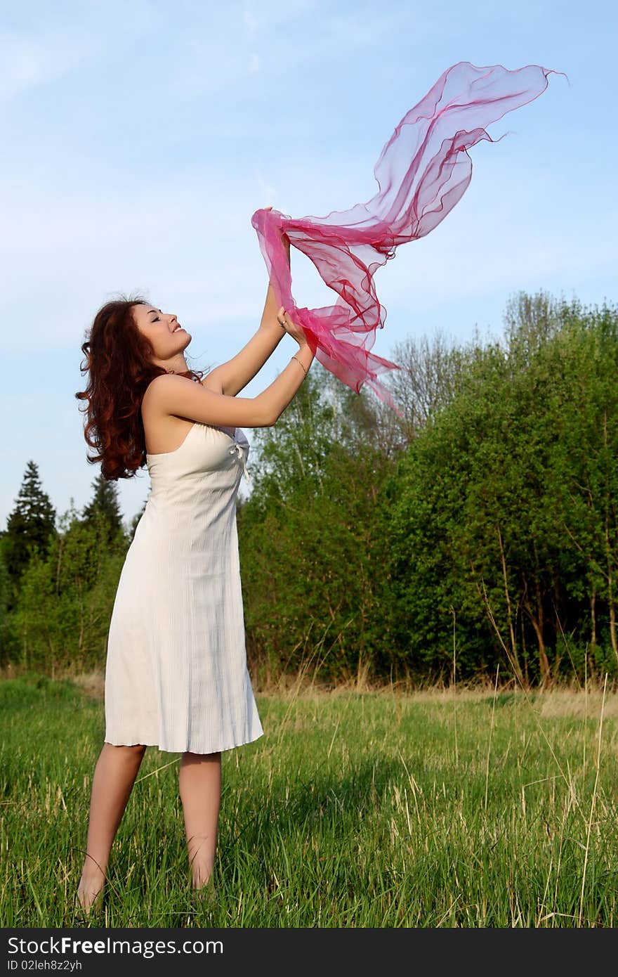 Girl dances with a scarf on nature. Girl dances with a scarf on nature