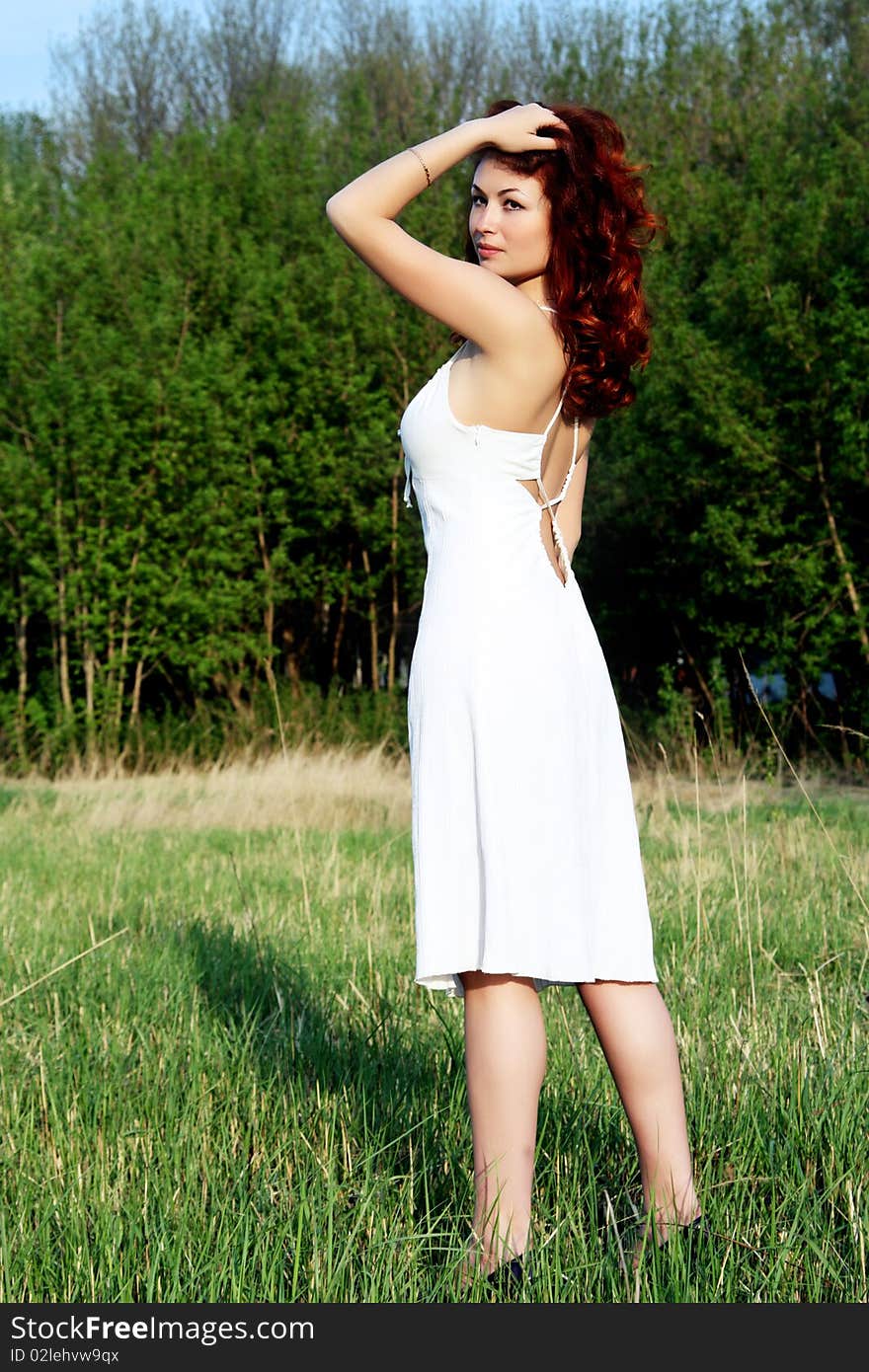 Portrait of a girl outdoors in spring in the park