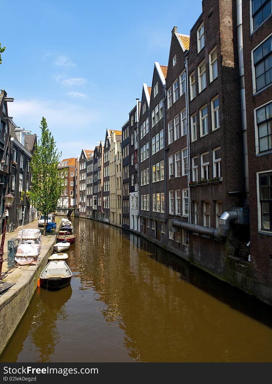 Tourist boat in the beautiful Amsterdam Canals