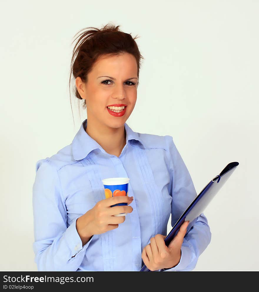 Young woman with documents holding a plastic cup