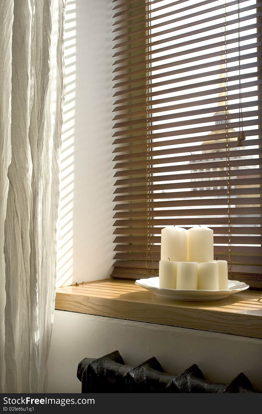 Image of candles on a windowsill