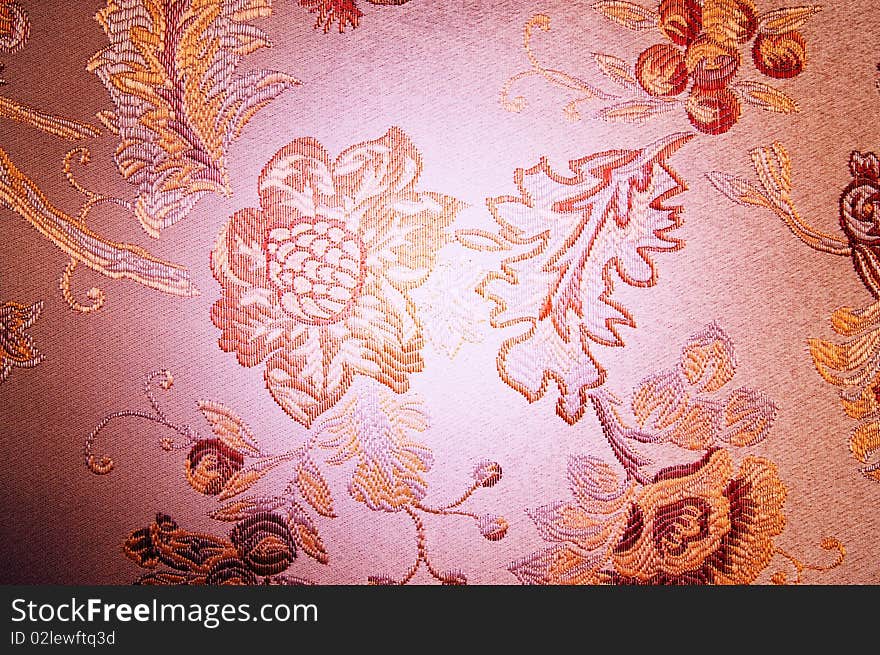 Wonderful flowers embroidered on the canvas.