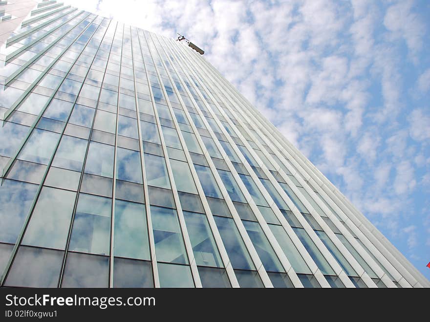 Architectural details of a modern glass wall of an office building. Architectural details of a modern glass wall of an office building