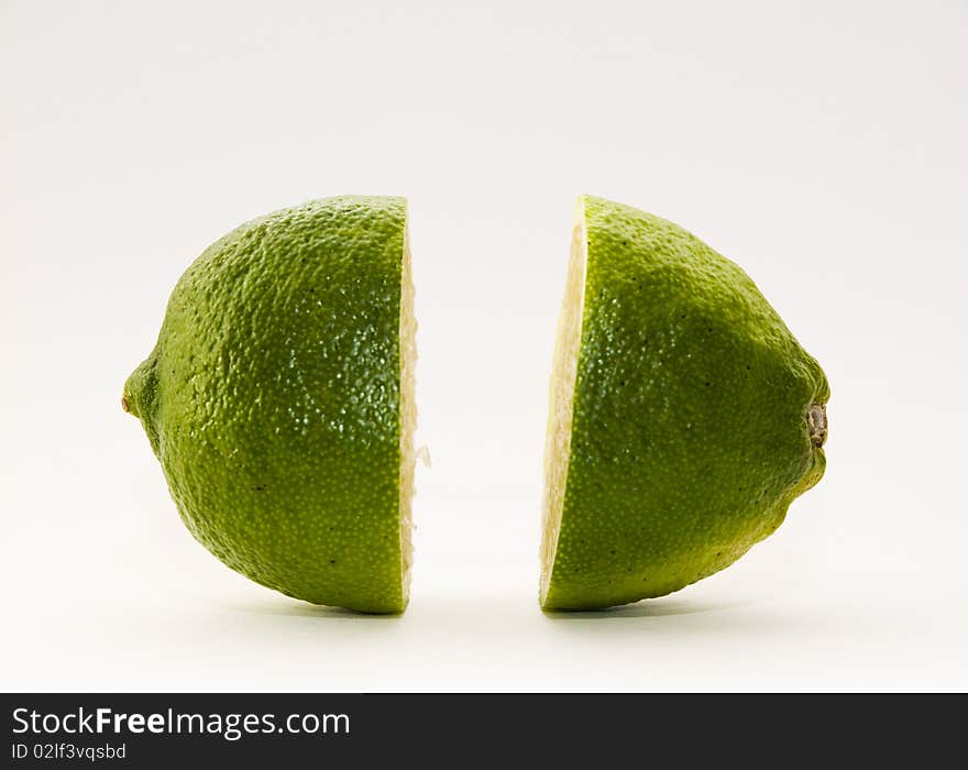 Levitating lime on white background