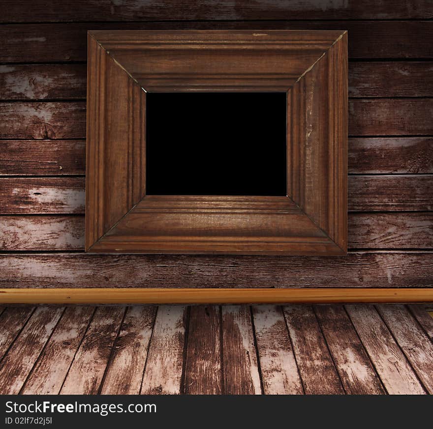 Wooden grunge interior with picture frame