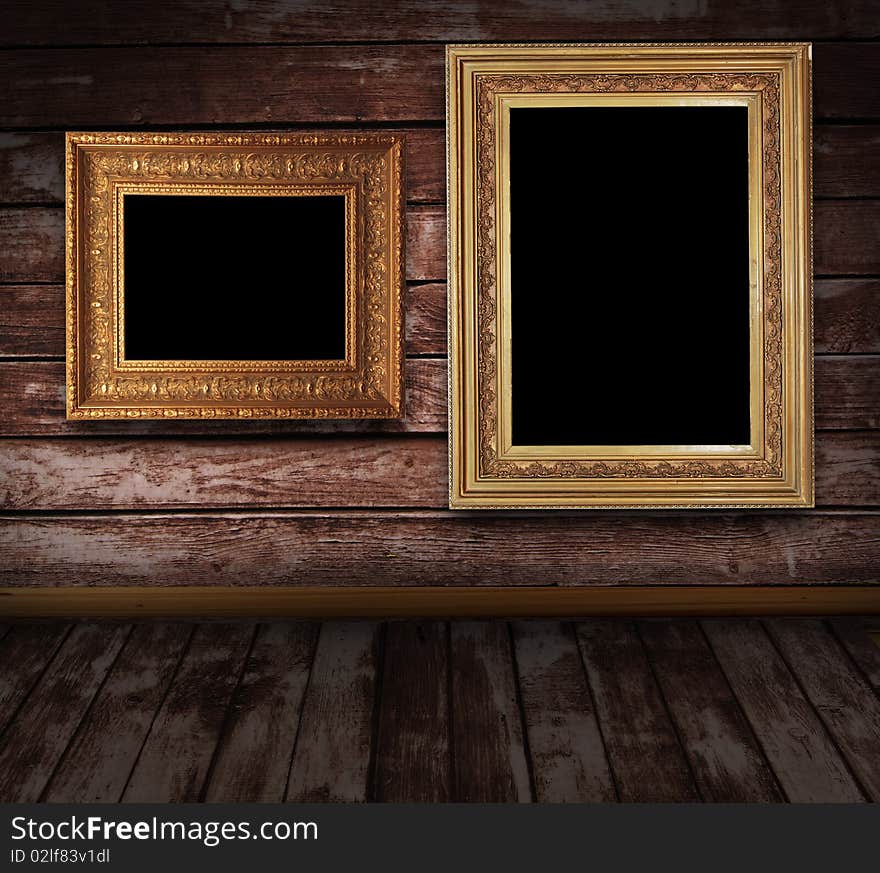 Wooden grunge interior with picture frames