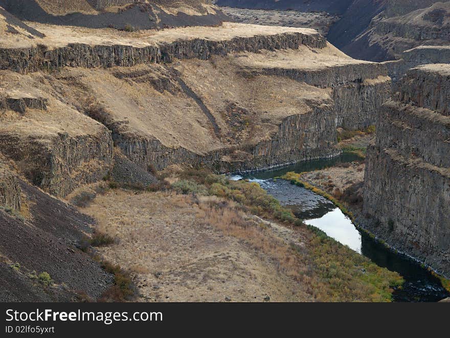 The Palouse River, winding its way through a dry desert canyon before it flows into the Snake River, Washington. The Palouse River, winding its way through a dry desert canyon before it flows into the Snake River, Washington