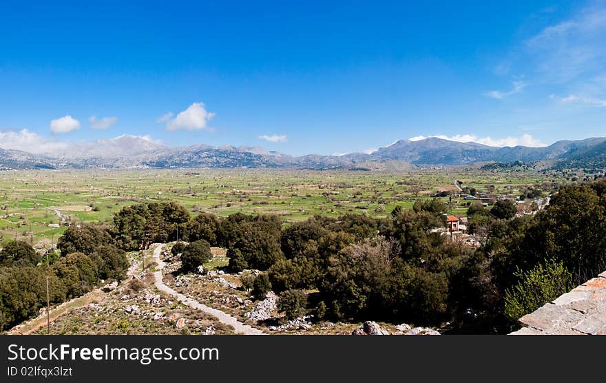 Panoramic landscape of Lasithi Plateau in spring in Crete island, Greece