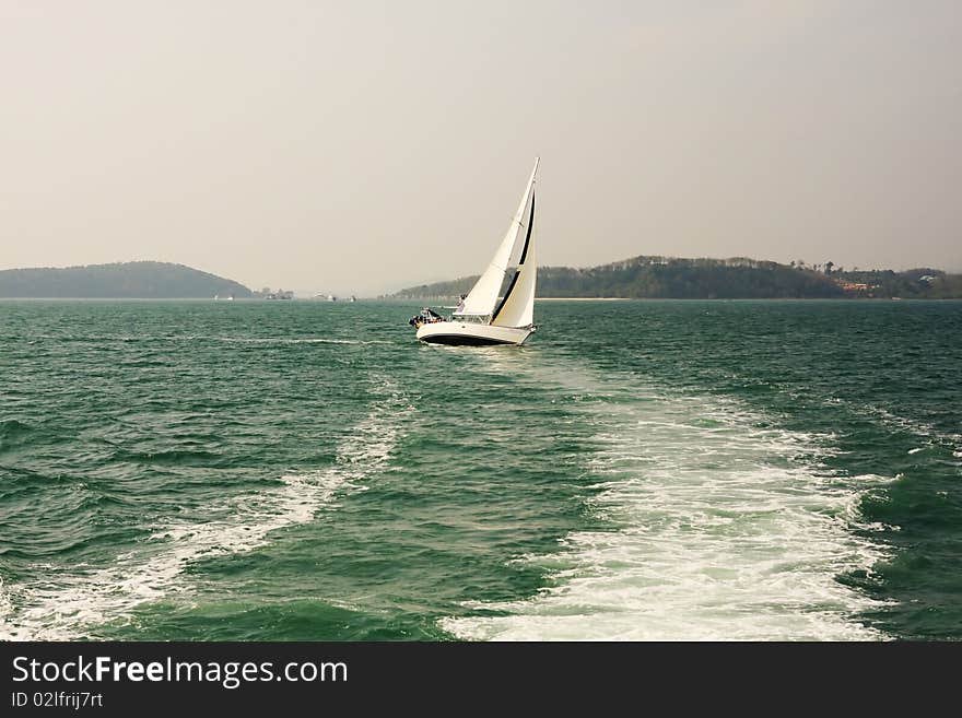 Alone yacht in the ocean