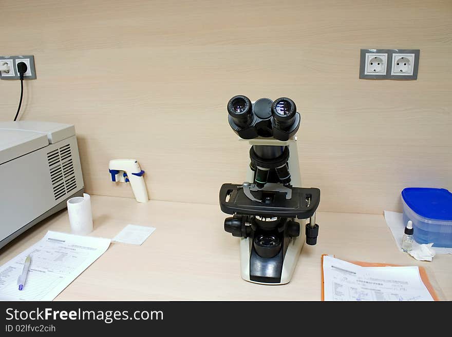 Medical Laboratory with a modern microscope and work place.