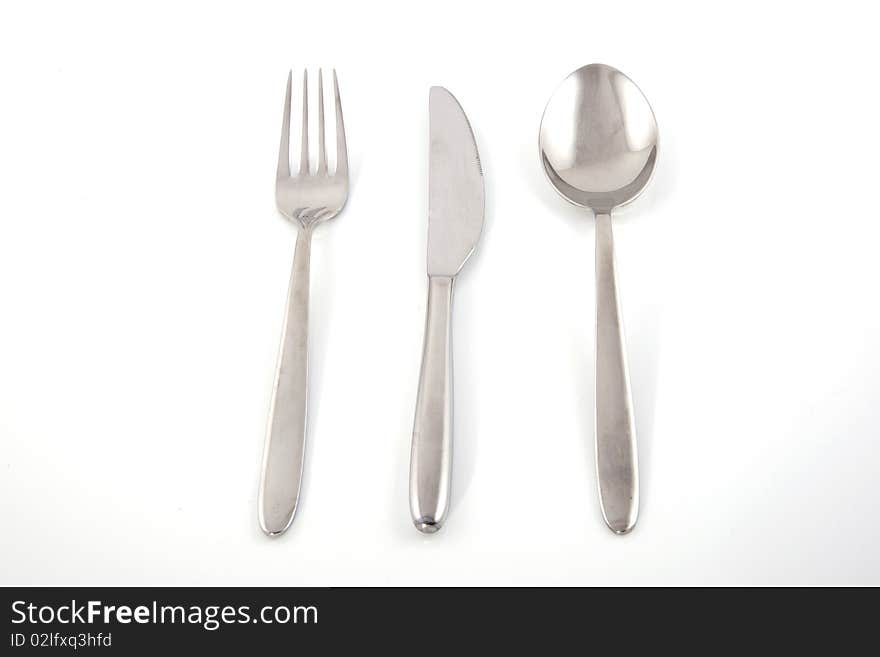 Table silver at a white background. Table silver at a white background.